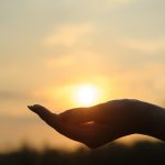 Holding the sun in your hand